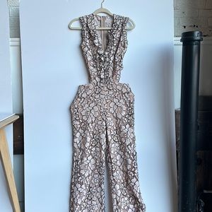 Alexis jumpsuit w cut outs size XS